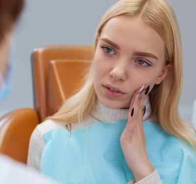 A female patient receiving emergency dentistry services in kansas city