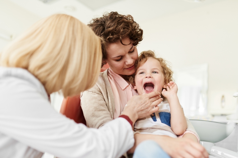 Child meeting the team at Staley Dental Arts, a kids dentist near me option in Kansas City.