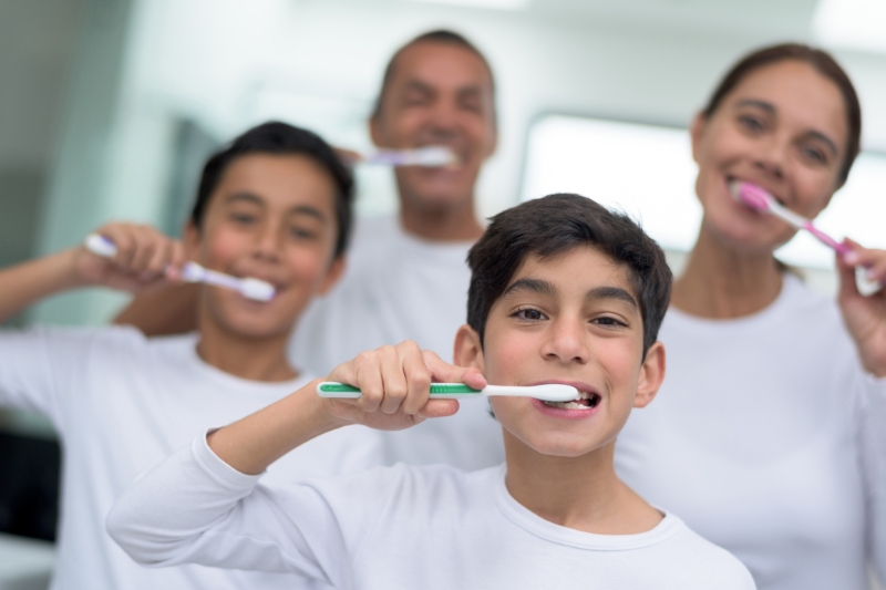 Family after receiving pediatric dentistry care at Staley Dental Arts.